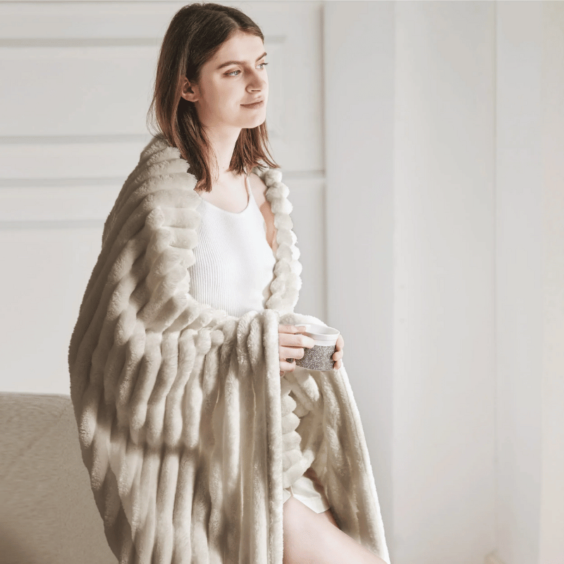 WavePlush - Morbida e calda coperta per coccole a casa