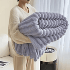 WavePlush - Morbida e calda coperta per coccole a casa