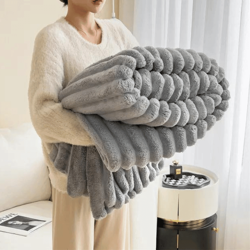 WavePlush - Morbida e calda coperta per coccole a casa