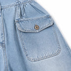 Ellora – Salopette in denim a gamba larga con bottoni frontali e tasche