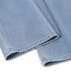 Ellora – Salopette in denim a gamba larga con bottoni frontali e tasche