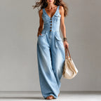 Ellora – Salopette in denim a gamba larga con bottoni frontali e tasche