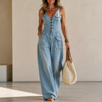 Ellora – Salopette in denim a gamba larga con bottoni frontali e tasche