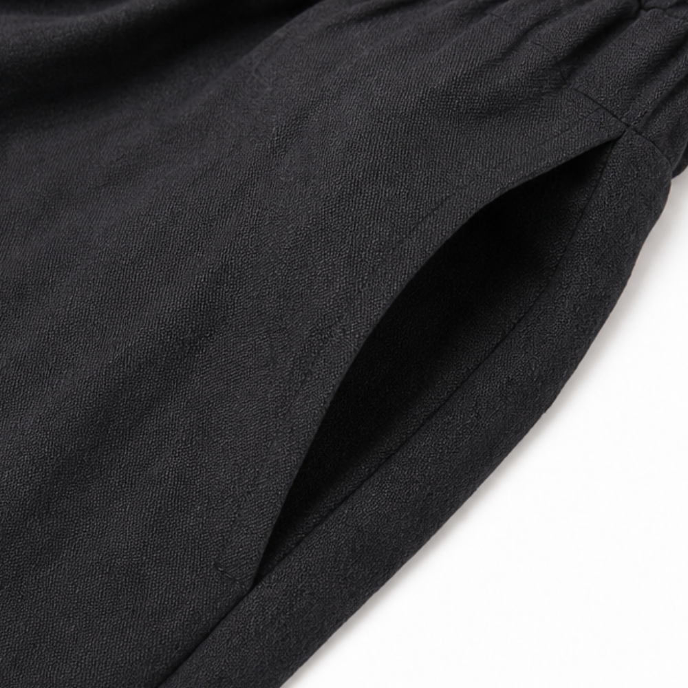 Solivia – Pantaloni larghi cropped con orlo a tulipano e tasche