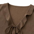 Vellara – Blusa senza maniche con rouches e scollo a V con fiocco e orlo peplum
