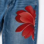 Florenza – Jeans a gamba larga floreali audaci da donna