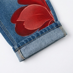 Florenza – Jeans a gamba larga floreali audaci da donna
