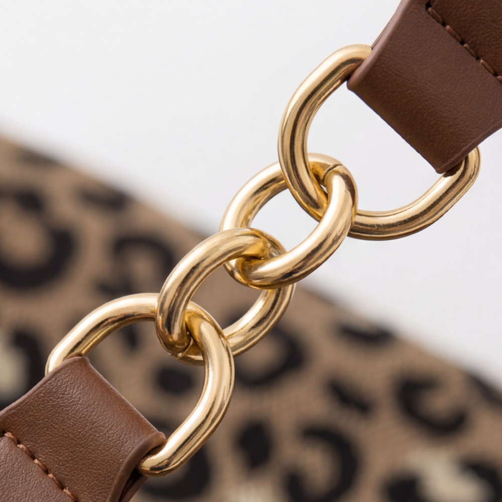 Lynxe - Borsa a spalla con stampa leopardata e dettagli in catena