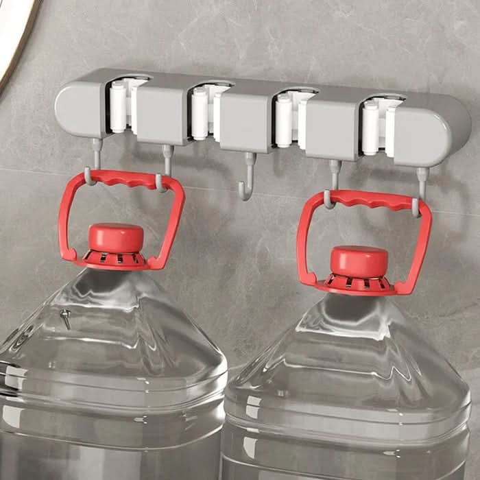 Supporto a muro versatile per attrezzi domestici
