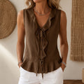 Vellara – Blusa senza maniche con rouches e scollo a V con fiocco e orlo peplum