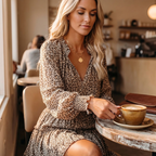 Vivara – Abito mini con scollo a V e maniche a lanterna