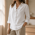Roselle - Blusa a maniche lunghe con scollo a V e volant morbidi